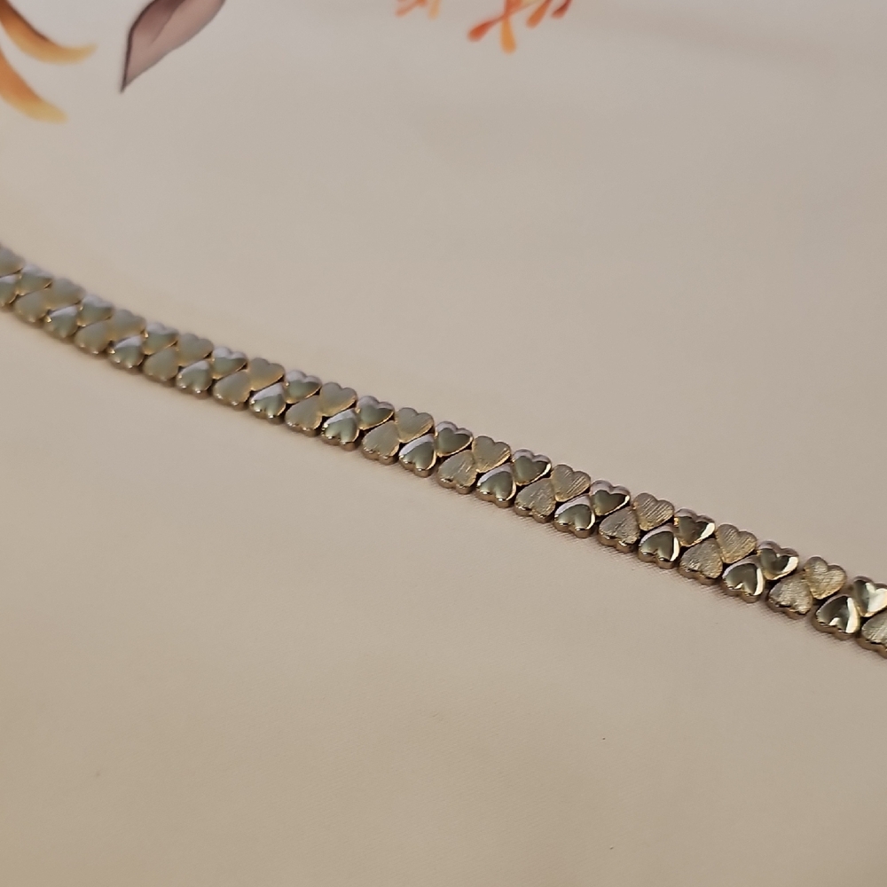 Gold Plated Interlocking Heart Bracelet With Safety Closure